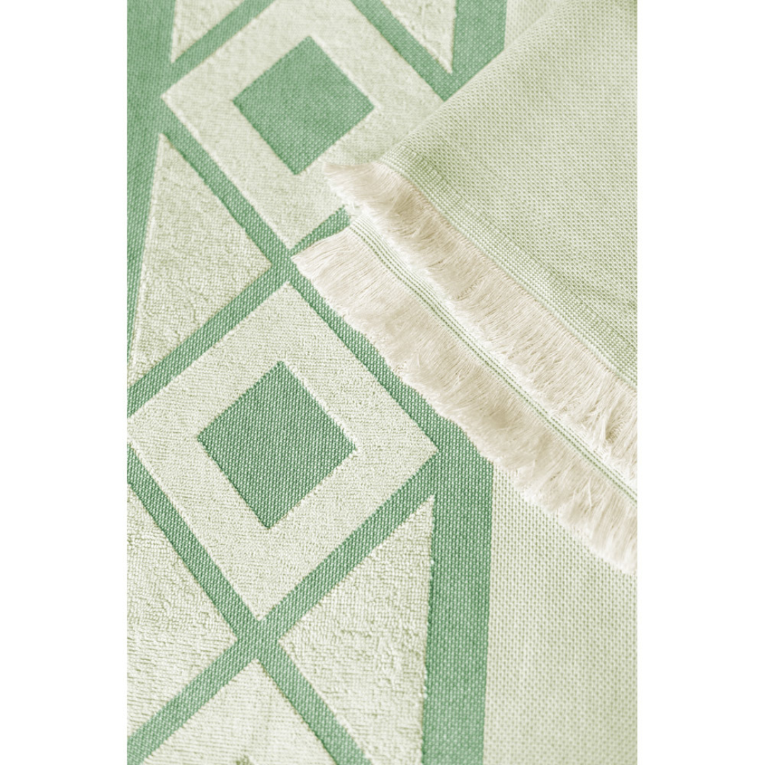 Toalla multifuncional de algodón reciclado con certificación OEKO-TEX®, fabricada en Europa.